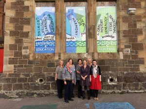 Attendees and Ailsa from RSH standing infront of the Rockfield Centre, Oban